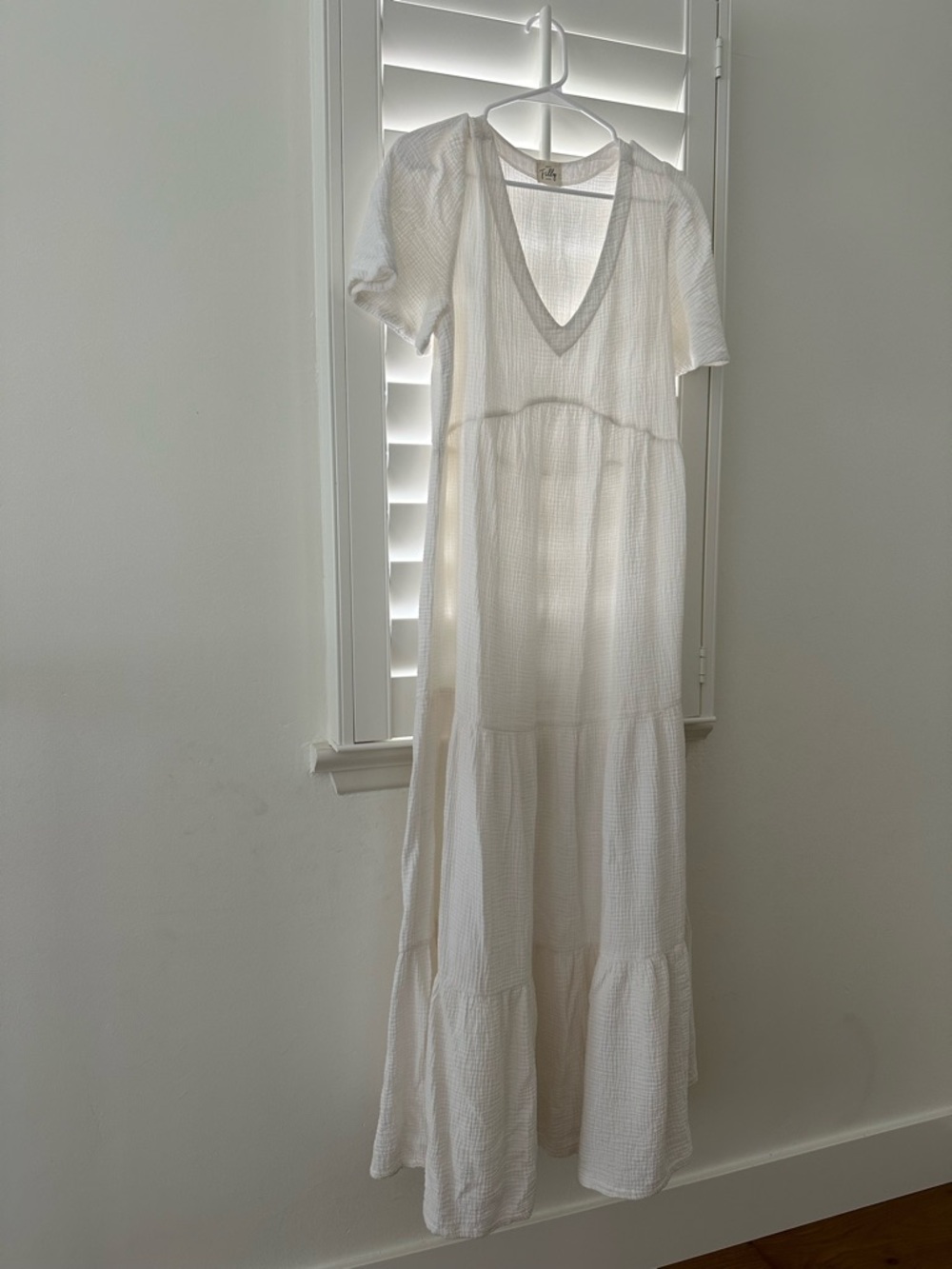 From Anthropologie White V-Neck Tiered Maxi Dress
